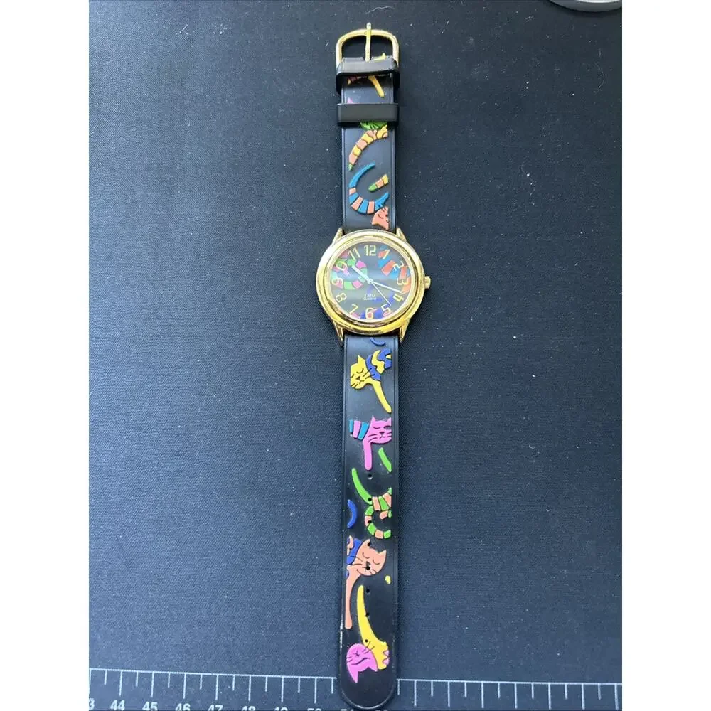 Gold Tone Cat Band Women’s Quartz Watch